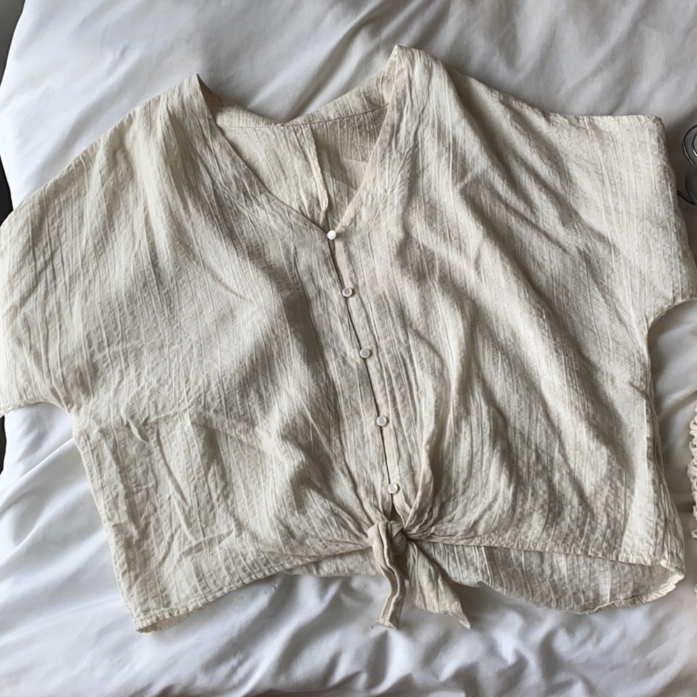 Tan cute top with buttons and tie front